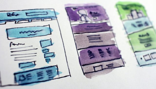 Hand drawn website wireframe sketches on paper