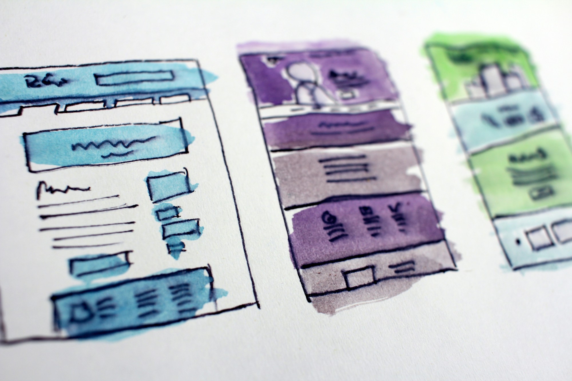 Hand drawn website wireframe sketches on paper